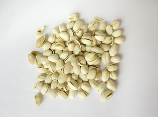 Pistachios isolated on white background, top view. 