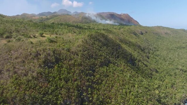 Aerial shot forest fire in Cabo Cabron National park, Samana, Dominican Republic