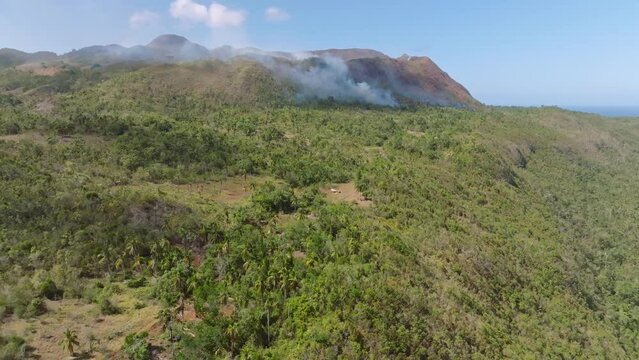 Drone view of forest fire in Cabo Cabron National park, Samana, Dominica