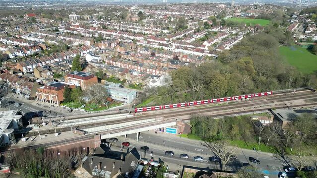 Tube train on Northern Underground line Finchley , station, London UK Drone, Aerial,