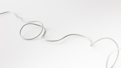 Grey power cable isolate on white background. telephone cord.