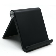 a black mobile phone holder stand which is foldable and adjustable for multiple angles isolated in a white background