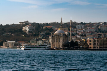 Ortakoy Mosque (Buyuk Medjidie Kamii) in Besiktas district on the embankment of the Ortakoy Pier Square from the waters of the Bosphorus, Istanbul, Turkey