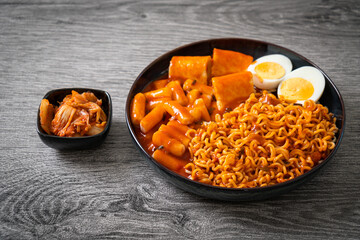 Korean instant noodles with Korean rice cake and fish cake and boiled egg