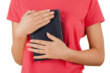 Woman in red shirt holding book isolated on white background