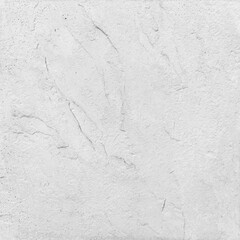 outer surface texture of the cement concrete block, which is a building material. The color is mono tone and has rough, irregular cracks or big scratches. It can be used as a background, copy space.