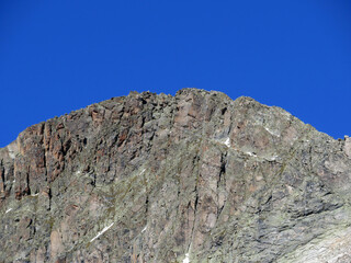 Rocky mountain peak Piz Radönt or Piz Radoent (3064 m) in the Albula Alps and above the alpine valley Val Grialetsch, Zernez - Canton of Grisons, Switzerland (Kanton Graubünden, Schweiz)