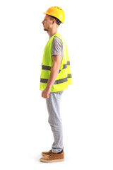 Male worker in vest and hardhat on white background