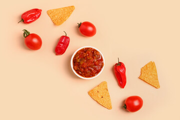 Composition with bowl of salsa sauce, vegetables and nachos on color background - obrazy, fototapety, plakaty