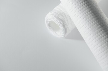 filter cartridges for water on a white background. Installation of reverse osmosis water purification system.