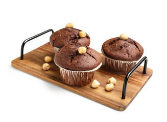 Wooden board with tasty chocolate cupcakes isolated on white background