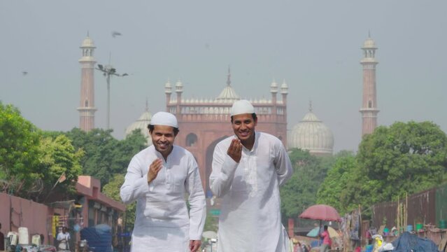 Two Muslim adab at Jama Masjid mosque in Delhi