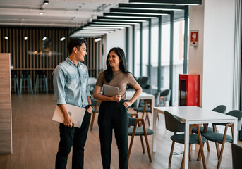 After class, college students discuss, share ideas and thoughts, and learn from each other. Modern...