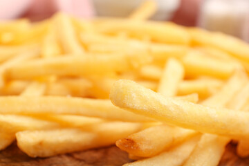 Tray with tasty french fries, closeup