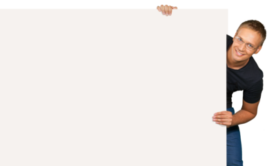 Man holding blank card and smiling at camera