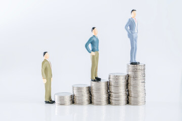 Investment merchant puppet model and coin of white background