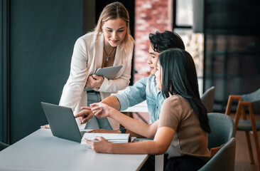 After class, college students discuss, share ideas and thoughts, and learn from each other. Modern and spacious areas in academic libraries that support a more tech-oriented and collaborative society