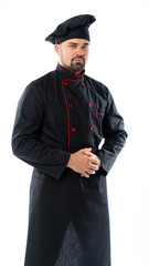 portrait of a male chef in a black suit, uniform with canned food, plate, basket, saucepan, frying pan or knives. isolated white background