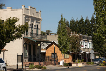 Elk Grove, California, USA - July 16, 2021: Afternoon sunlight shines on historic downtown Elk...