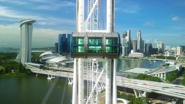 Aerial view of Singapore ferris wheel. Marina Bay Sands and Gardens by the Bay. travel landmark, tourism attraction.