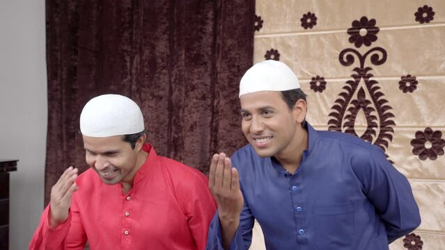 Two muslim men doing Adaab or giving greetings