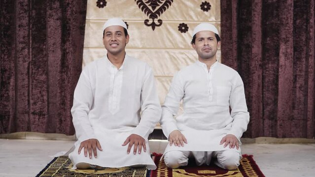 Muslim men doing Adab gesture