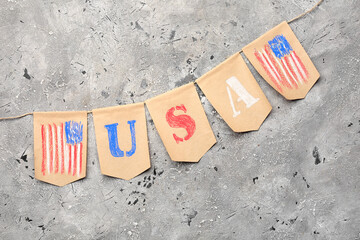 USA flags on grunge background. Memorial Day celebration