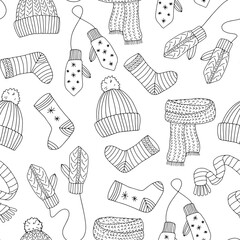 Seamless pattern with warm knitted accessories. Hats mittens socks scarves on white background. Background with line patterns. Painted by hand. Doodles.