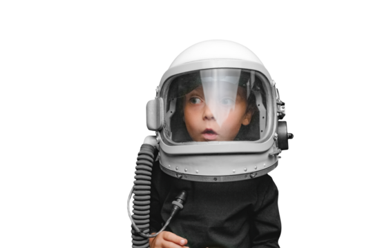 small child imagines himself to be an astronaut in an astronaut's helmet.