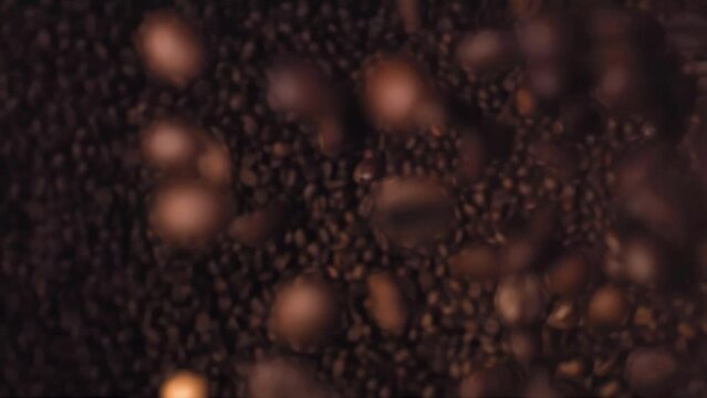 Coffee Beans Super Slow Motion Falling top down shot.
High Speed Coffee Beans flying