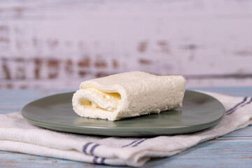 Fresh cow's cream. Dairy products. Cow's cream or clotted cream on wood background