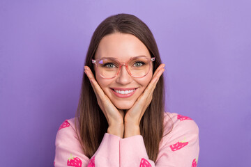 Photo of dreamy cute lady dressed strawberry print cardigan spectacles arms cheeks isolated purple color background