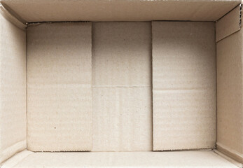 Open empty brown cardboard box background top view