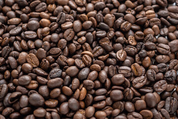 Fresh roasted brown coffee beans background