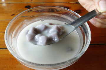 Traditional Thai dessert, bua loy, taro and coconut milk