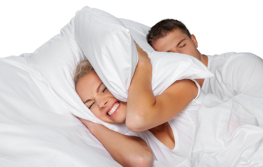 Young  couple sleeping on the bed in bedroom,man snores