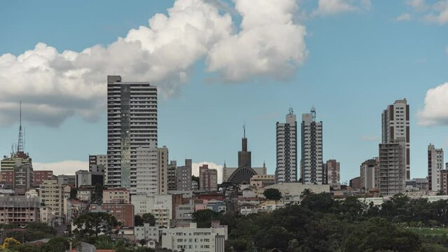 View of Sant'ana Cathedral Church and downtown buildings of Ponta Grossa city, Brazil, time-lapse capture