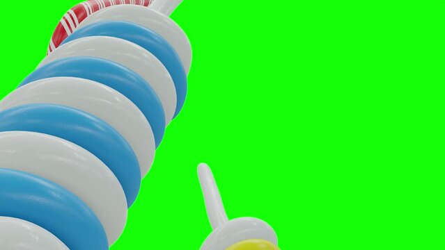 Huge and big Sweet Juicy Candies Lollipop Chupa Chups Caramel Toffee Sugar on Green Screen With Alpha Matte