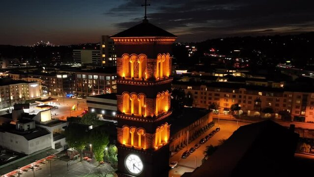 St Andrews Church in Pasadena, California at night - aerial orbit of the clock and bell tower