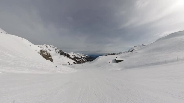 FPV of Snowboarder Gliding Down Gorgeous Mountain - POV Group Snowboarding Down Ski Slope in 6K | Insta360 (24 Fps)