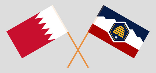Crossed flags of Bahrain and The State of Utah. Official colors. Correct proportion