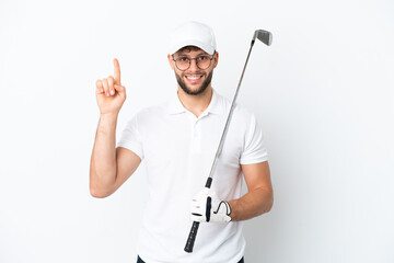 Handsome young man playing golf  isolated on white background pointing up a great idea