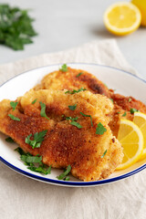 Homemade Chicken Cutlets on a Plate, side view. Close-up.