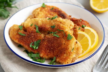 Homemade Chicken Cutlets on a Plate, low angle view. Close-up.