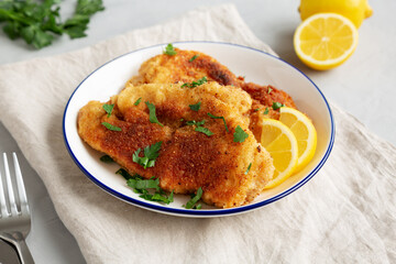 Homemade Chicken Cutlets on a Plate, low angle view. Close-up.