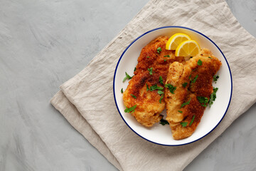 Homemade Chicken Cutlets on a Plate, top view. Flat lay, overhead, from above. Copy space.