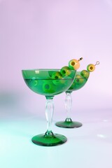 Classy Cocktails: Two Dirty Martinis with Olives in a Decorative Glass