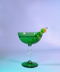 Sophisticated Sipping: A Green Coupe Glass Martini