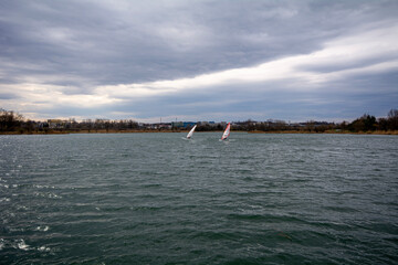 Windsurfing on a lake in the middle of the city of Krakow, Poland.
