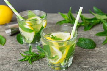 Mojito summer refreshing cocktail with ice and mint. mojito cocktail with lime, lemon and mint in a...
